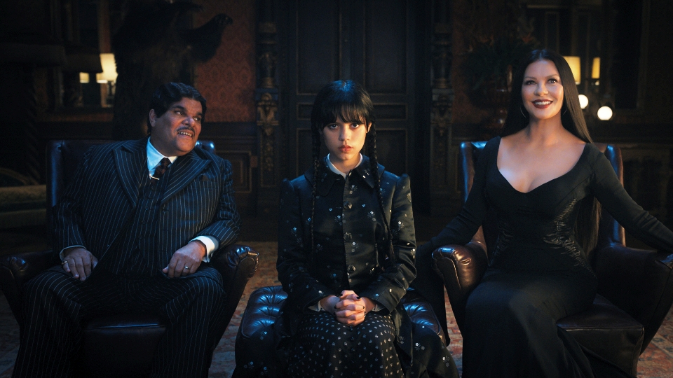 Gomez (Luis Guzmán), Wednesday (Jenna Ortega) & Morticia (Catherine Zeta-Jones)