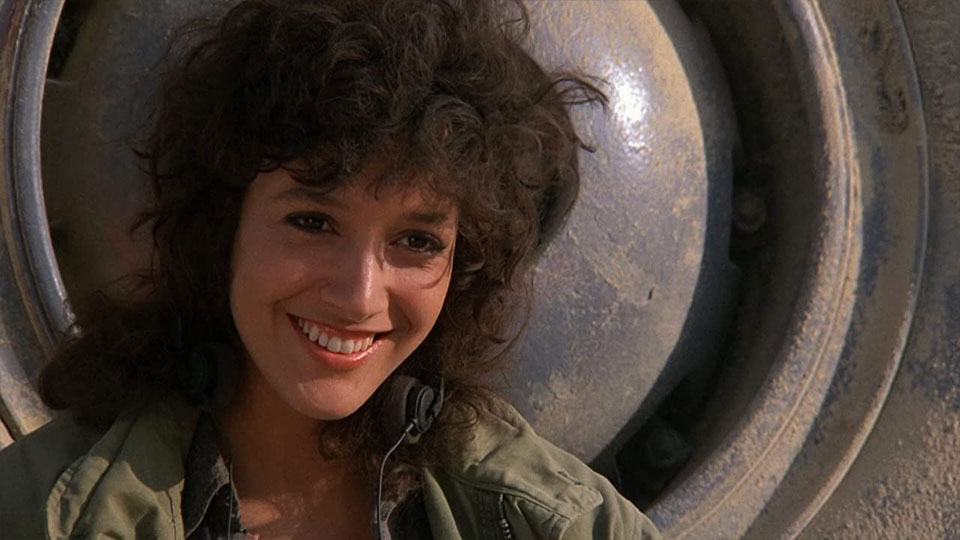 Alex (Jennifer Beals)